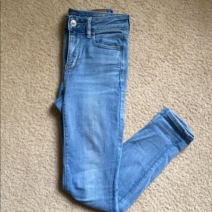 High-waisted light wash skinny jeans